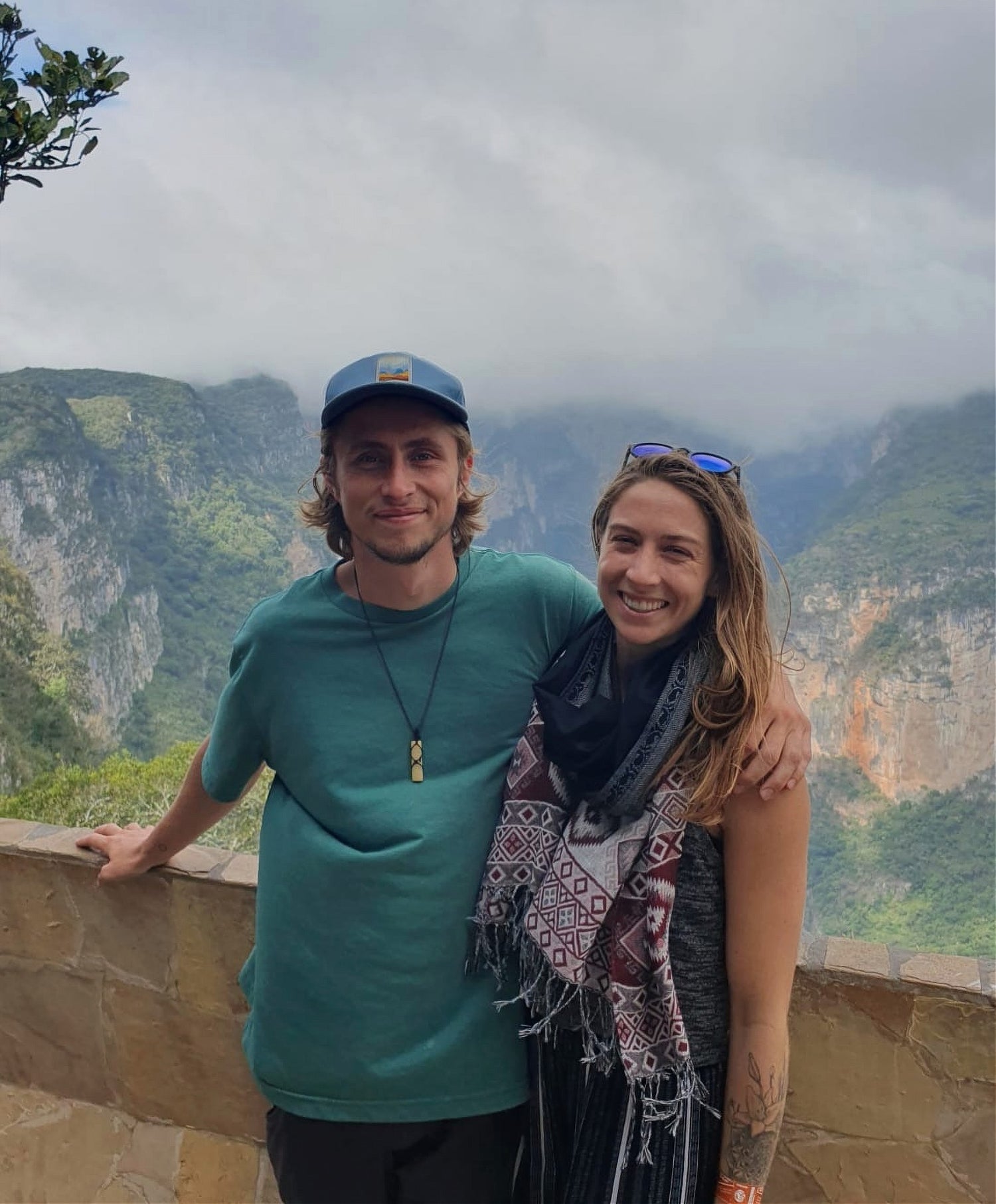A young couple in front of great view